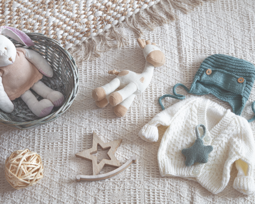 Image shows a flat lay of baby items.