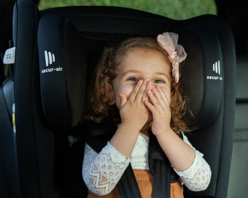 Image shows a child in an InfaSecure child restraint